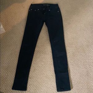Plain black skinny jeans, size 25